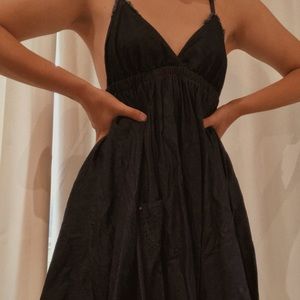 V-neck blue dress with white detailing